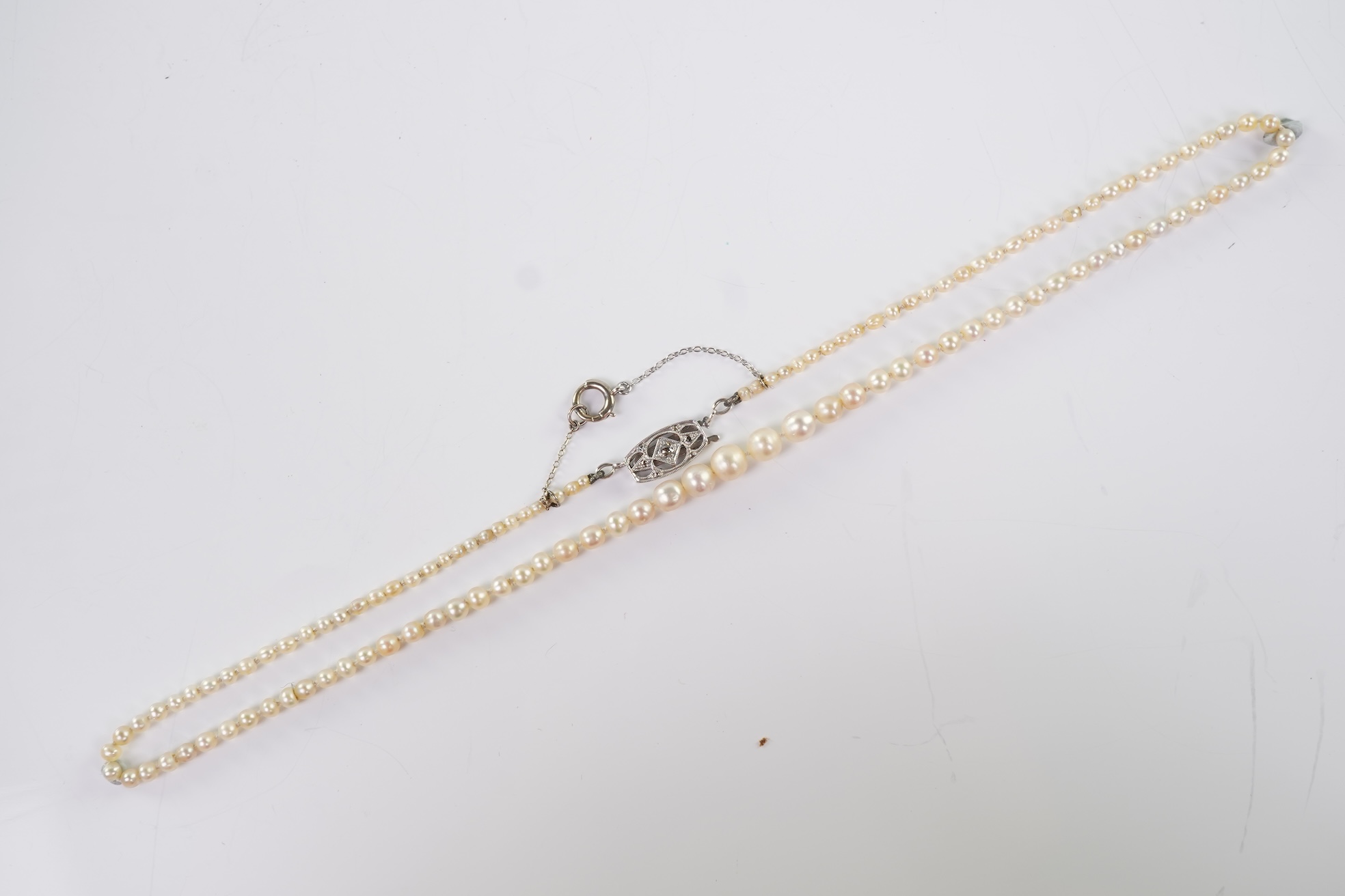 A cultured pearl and diamond necklace, early 20th century